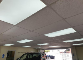An image showing a car show room with some newly fitted LED ceiling lights