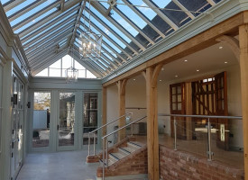 An image showing a large room with newly fitted decorative hanging ceiling lights