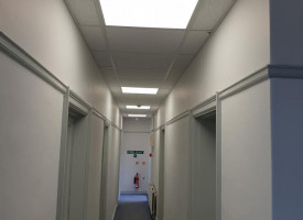 An image showing a hallway with some newly fitted LED lights