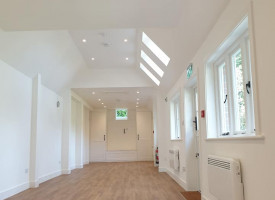 An image showing a hallway with some newly fitted LED lights