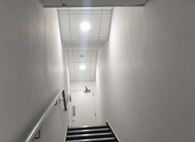 An image showing a hallway with some newly fitted LED lights