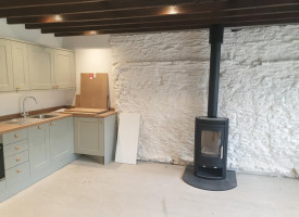 An image showing a kitchen with some newly fitted light fixtures