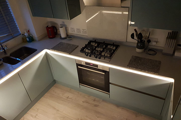 An image showing a kitchen with some newly fitted light fixtures